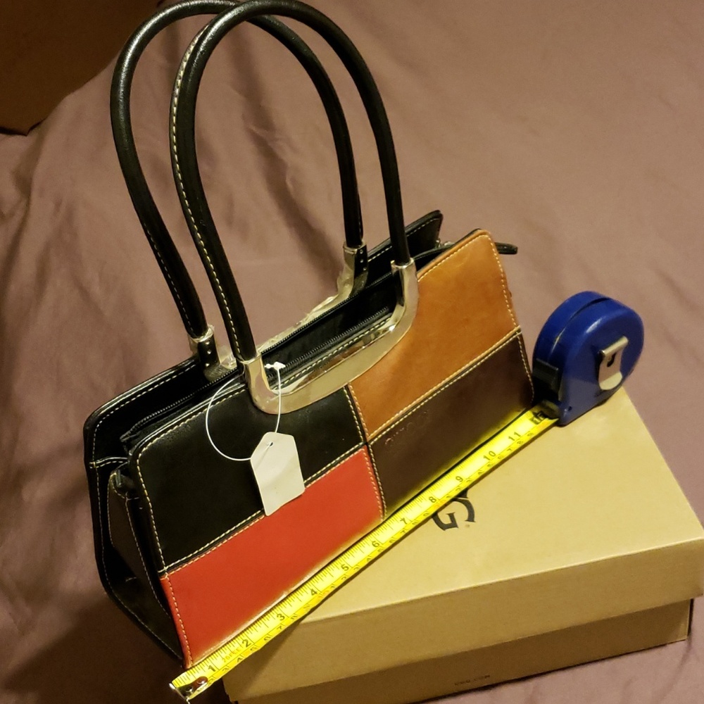 Multi color purse. NWOT.  Blk back.